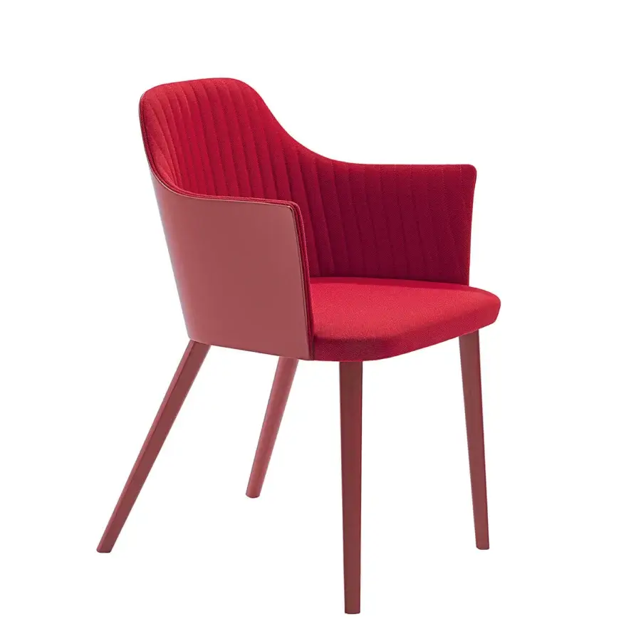 Superior Bross Break armchair upholstered in red fabric with quilted detailing and glossy lacquered legs