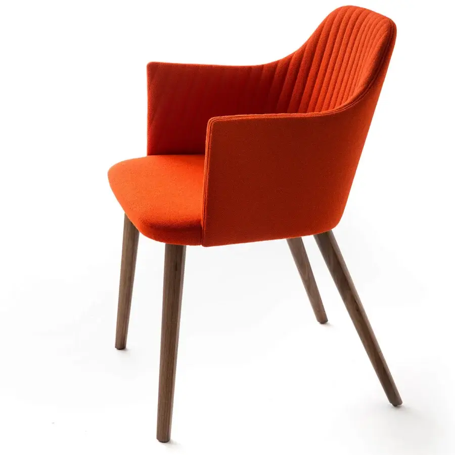 Distinguished Bross Break armchair fully upholstered in textured orange textile with quilted front and dark brown stained wood legs