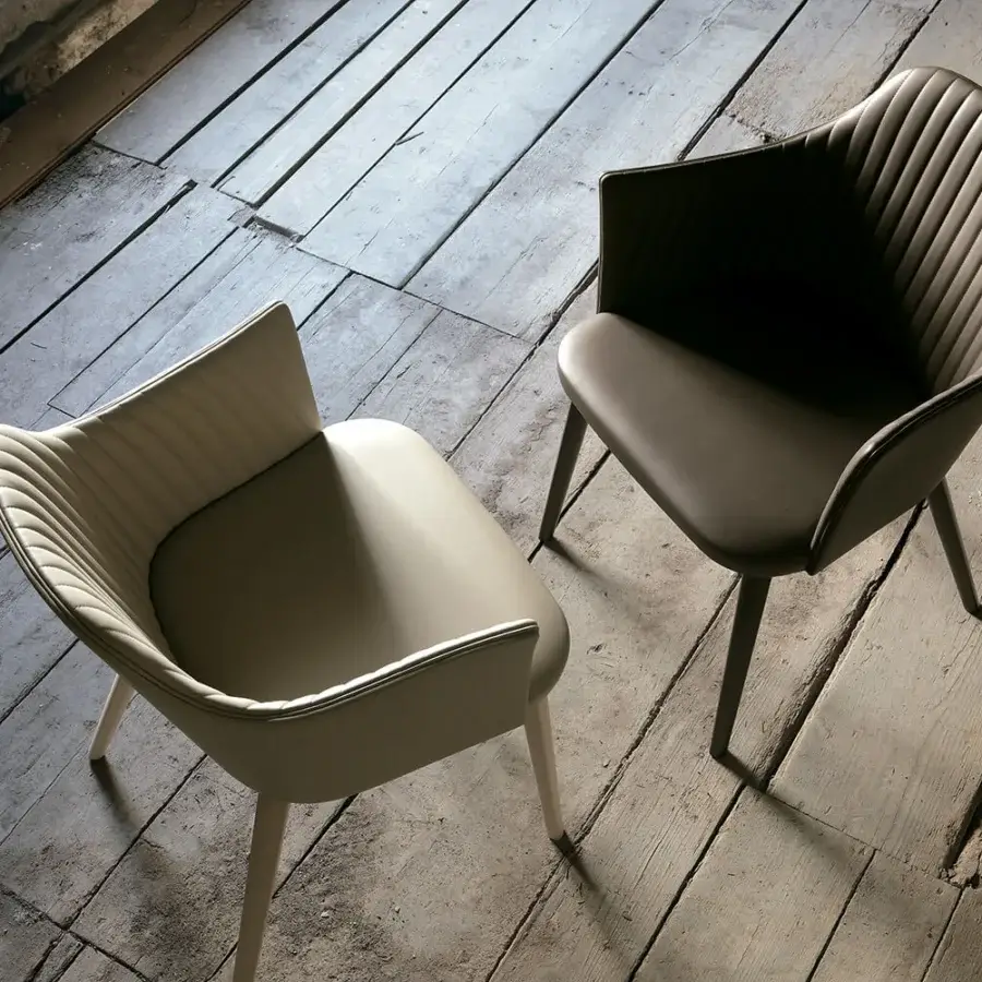 Superior Bross Break armchair fully upholstered in light beige premium fabric with refined vertical stitching and high-end wood legs