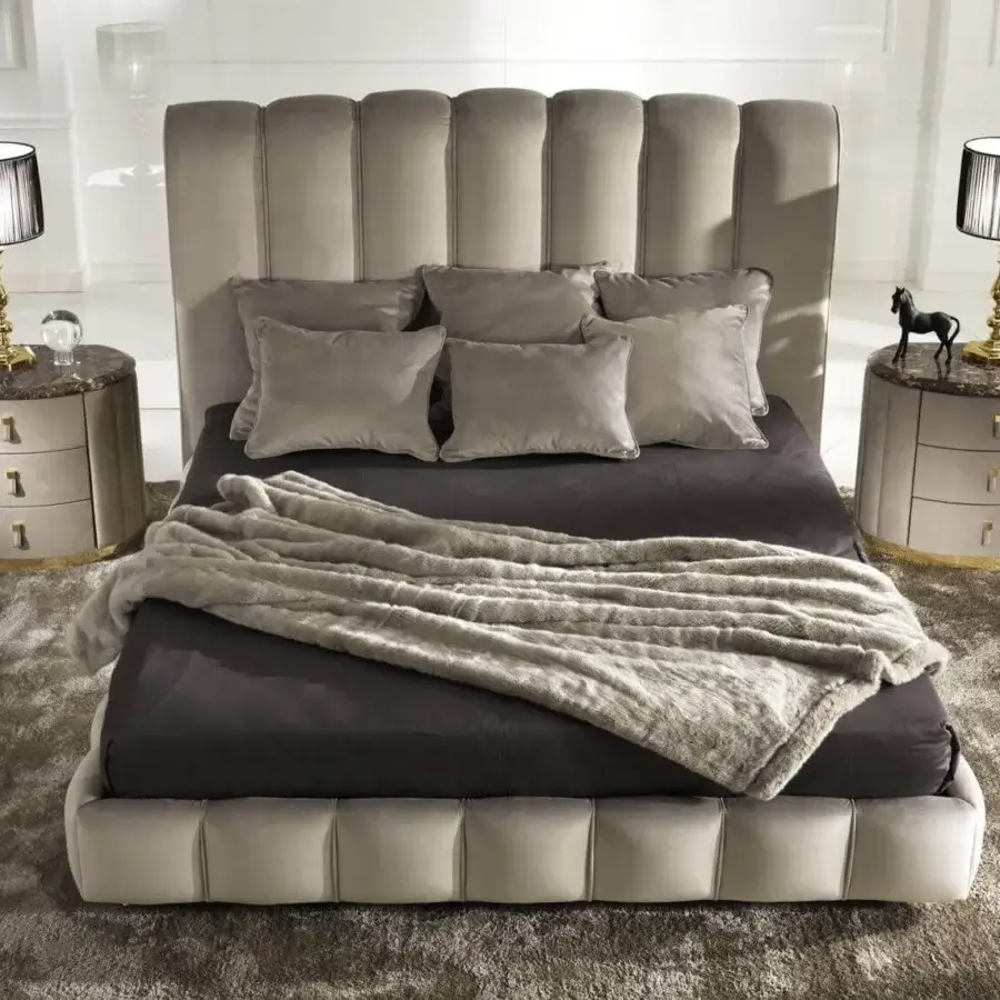 Distinguished DV Home Collection Byron bed with plush light beige fabric upholstery and a vertically paneled headboard
