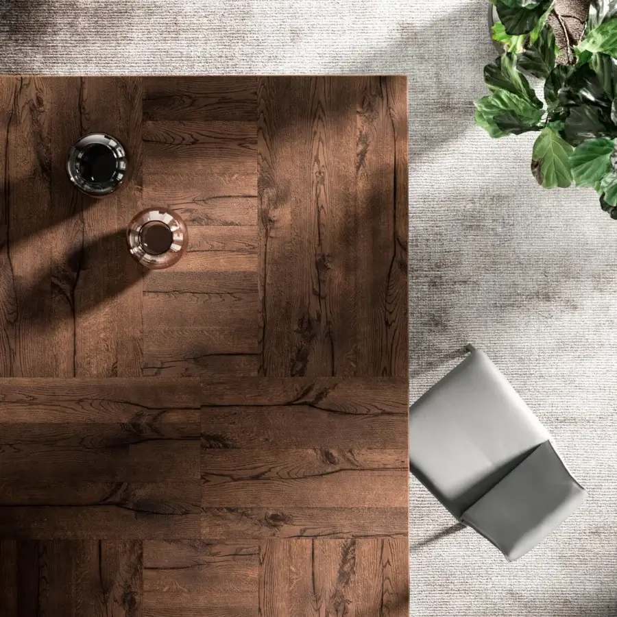 Superior Ozzio Italia 4x4 table with a dark brown wooden tabletop and striking extensions showcasing visible wood grain patterns
