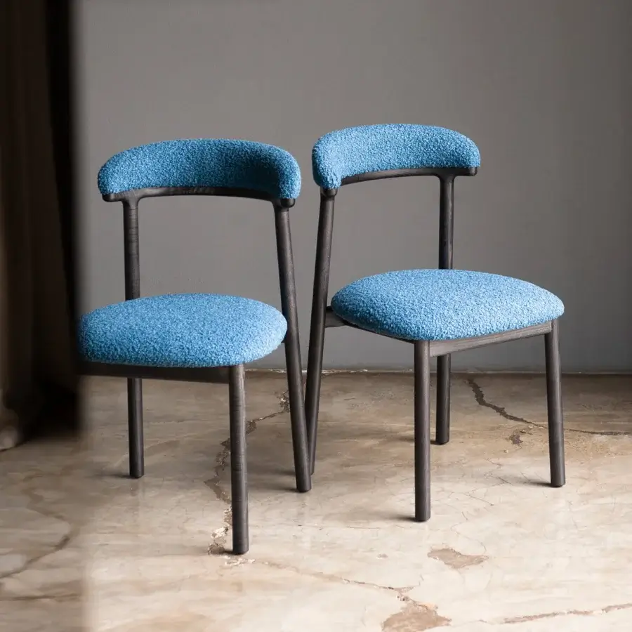 Superior Bross Lindy chair with blue fabric upholstery and high-end wood, crafted with a dark matte finish