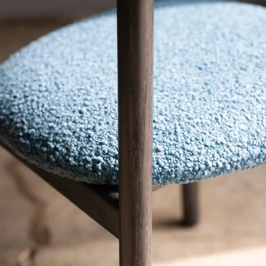 Exceptional Bross Lindy chair with light blue nubby textile upholstery and dark stained wood construction