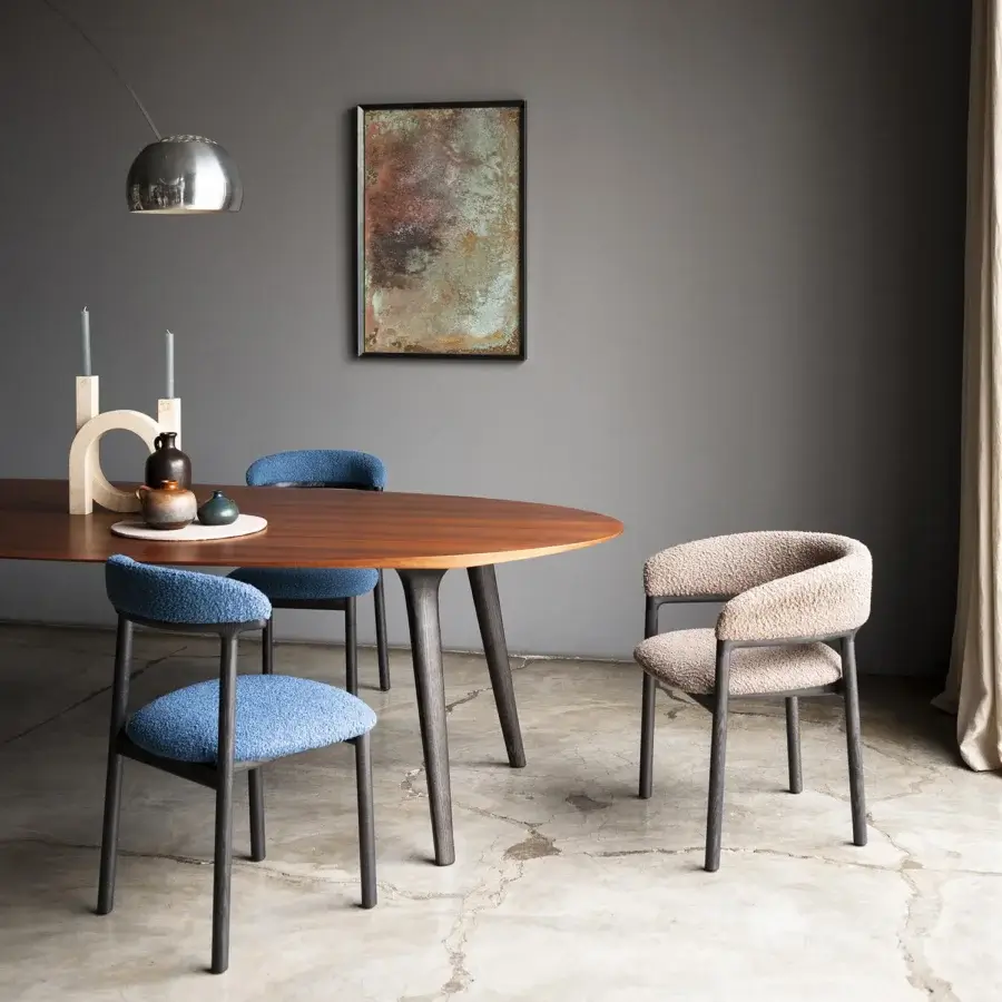 Superior Bross Lindy chair with light beige fabric upholstery and dark-toned wood construction