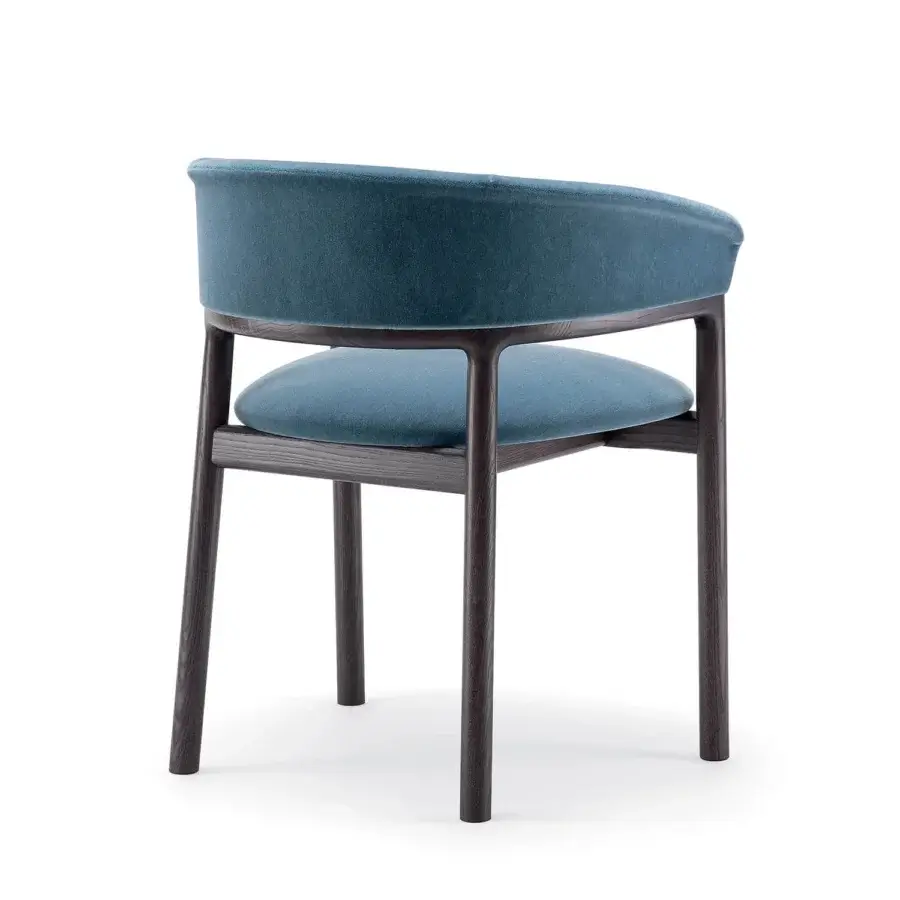 Lavish Bross Lindy armchair with muted-blue fabric upholstery and dark-toned wood construction
