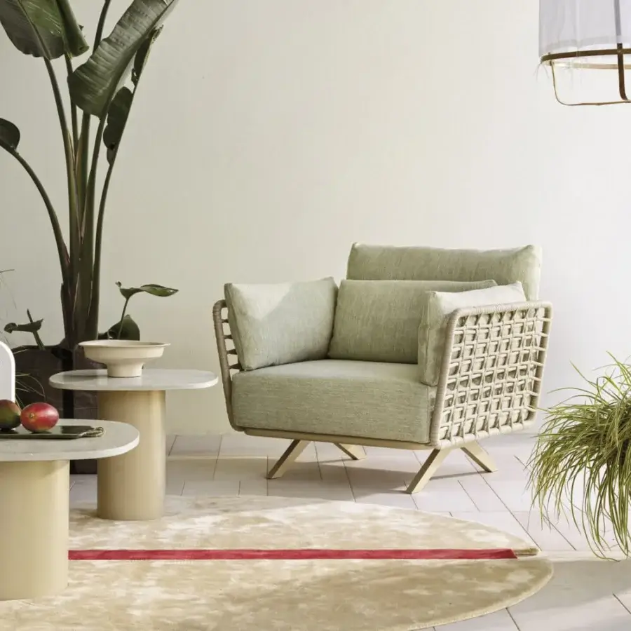 Exceptional Roberti Rattan Armàn lounge chair crafted with light green Oval Trendyrope and a powder-coated stainless steel frame