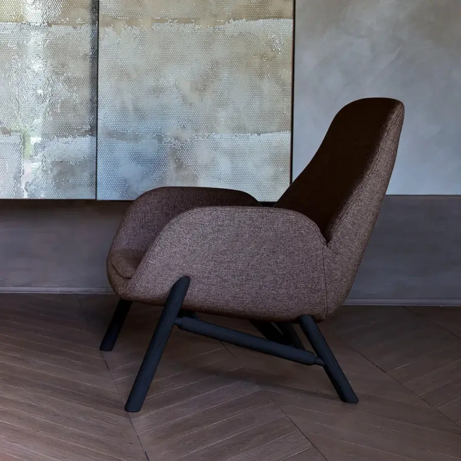Superior Bross Mysa lounge chair with textured brown textile upholstery and black-stained wood base crafted in Italy