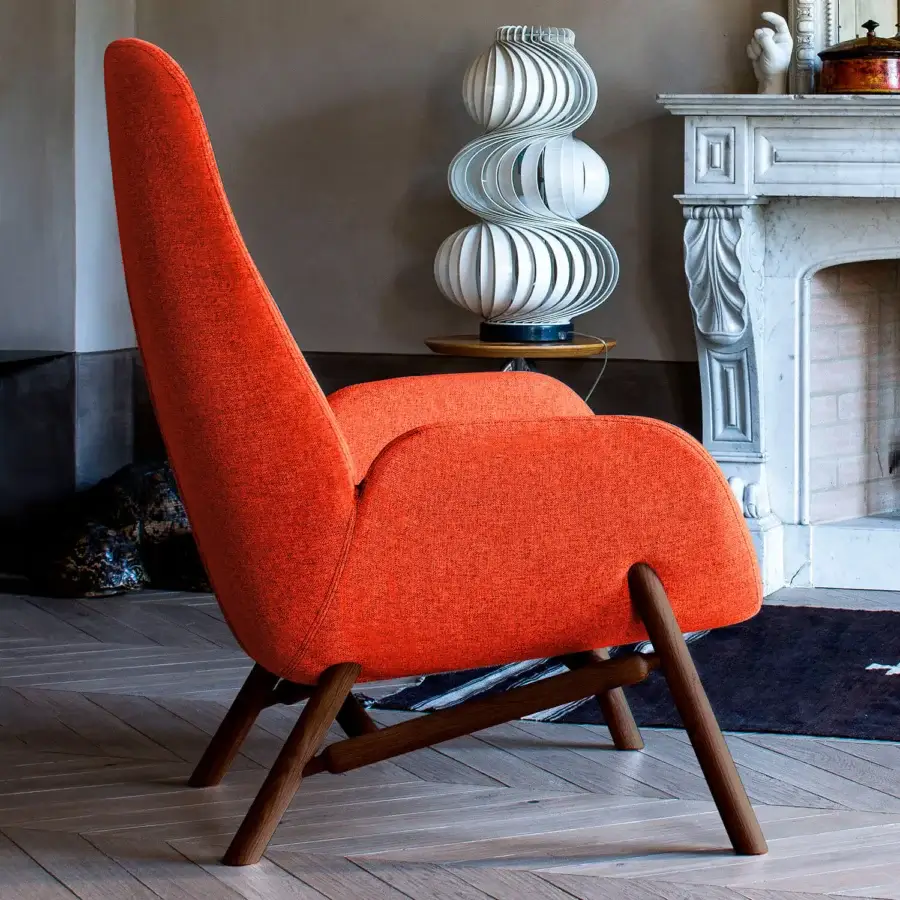 Captivating Bross Mysa lounge chair with orange fabric upholstery and dark-stained wooden legs