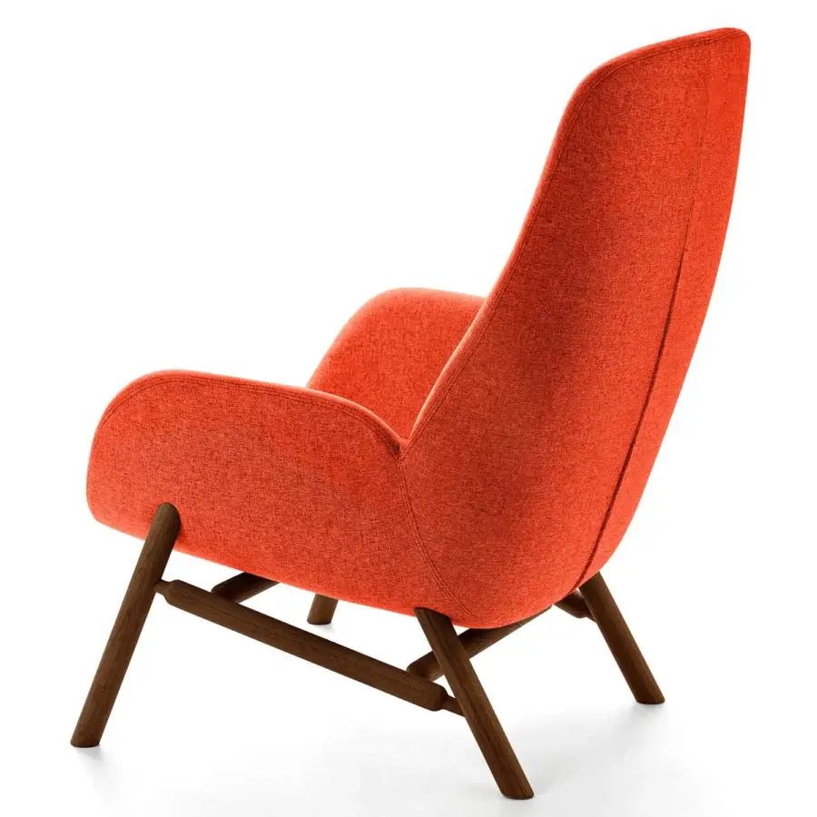 Exclusive Bross Mysa lounge chair with bright orange textile upholstery and dark-stained wood base