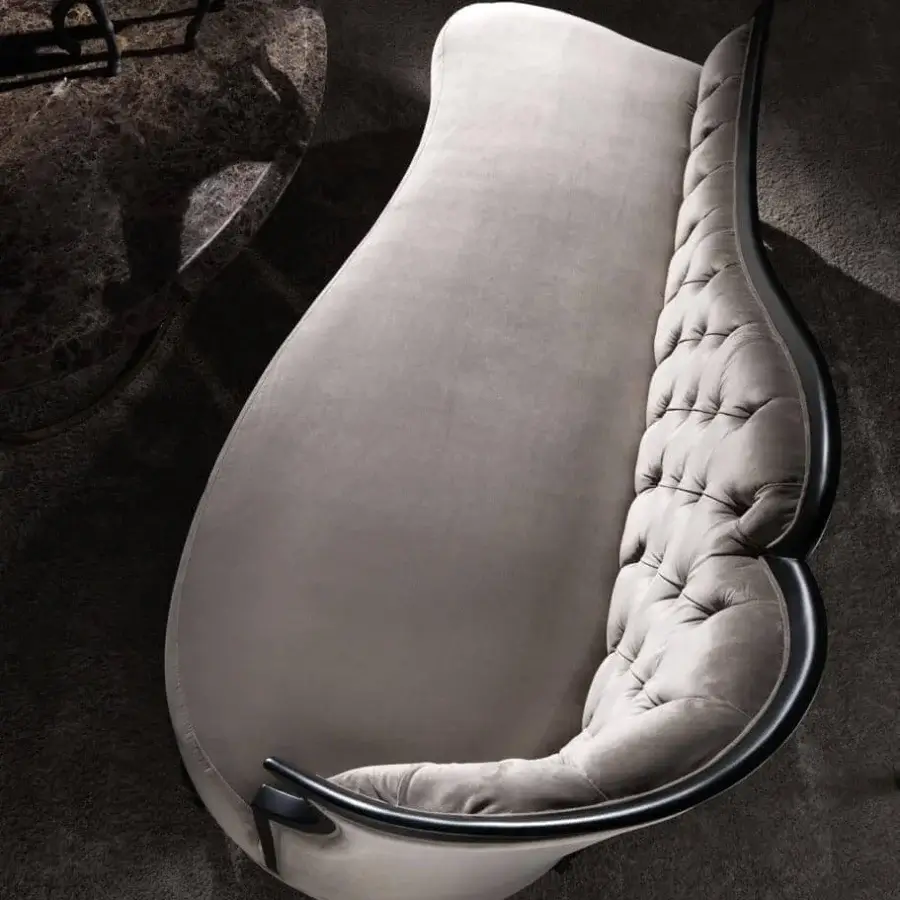Lavish DV Home Collection Rene chaise lounge with gray velvet upholstery and shining lacquered beech wood carving