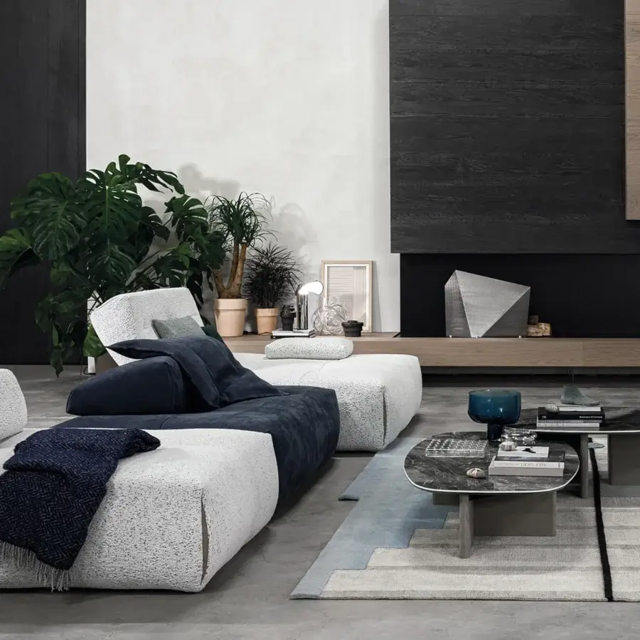 Exceptional Cierre1972 Wings coffee table with wooden legs covered in leather and ceramic with glass top in dark stone-like finish