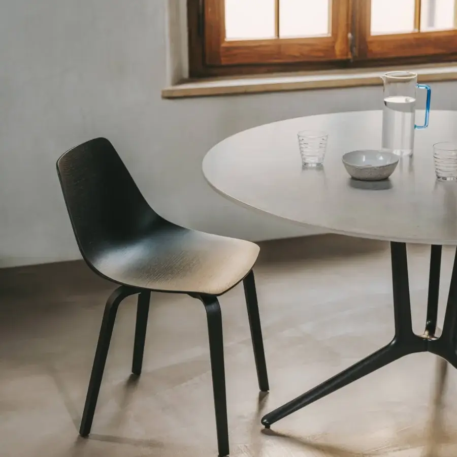 Elegant Lapalma Trail table with light gray concrete-like MDF top and dark powder-coated die-cast aluminum base