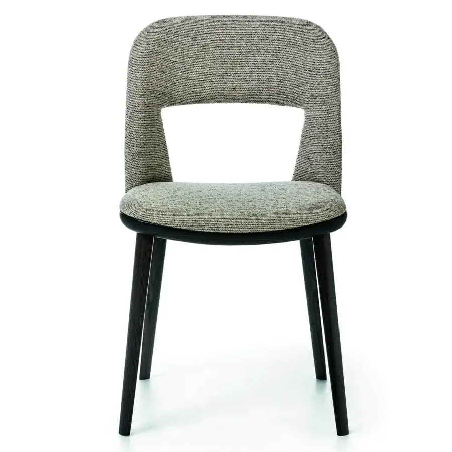 Distinctive Bross Path chair with rounded seat and cutout backrest upholstered in textured light and dark tones with dark stained wood structure