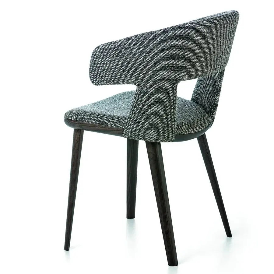Superior Bross Path armchair with speckled black and white textile upholstery and dark-toned wood frame