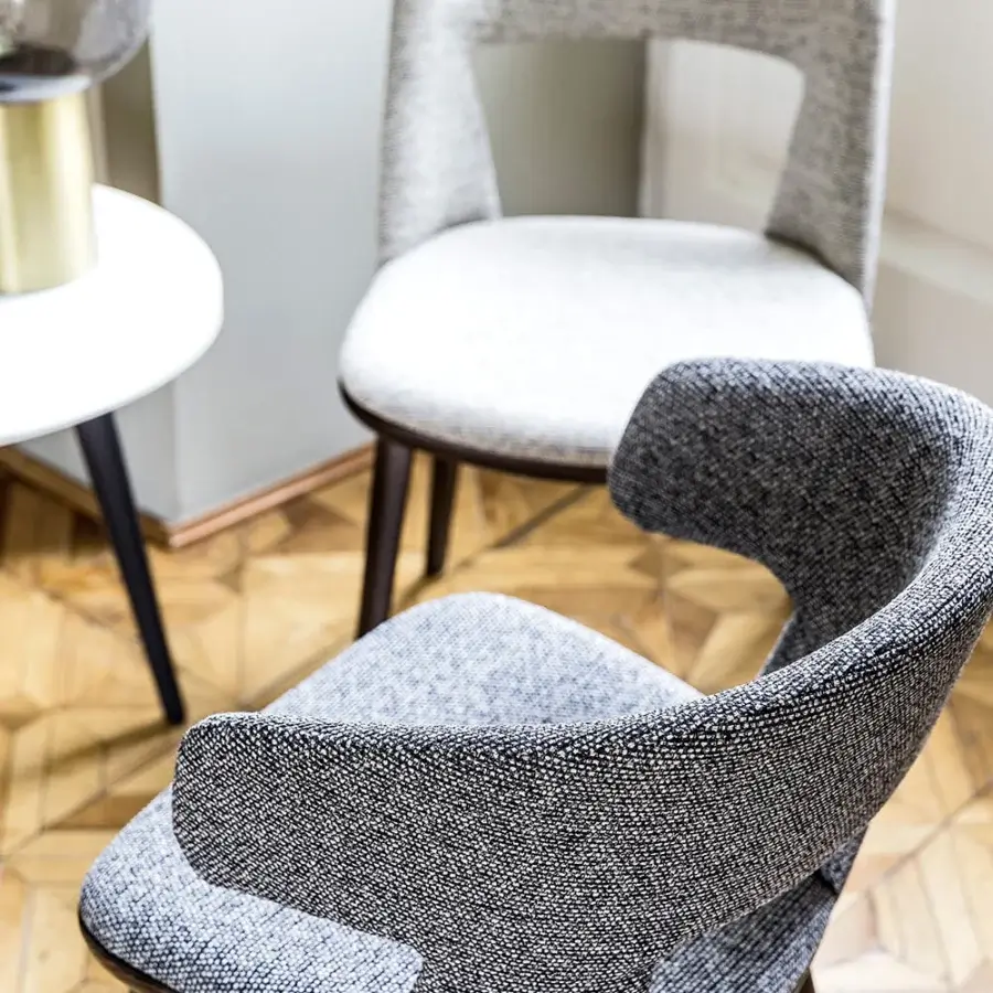 Exceptional Bross Path armchair with woven gray and white fabric upholstery and dark-toned wood legs