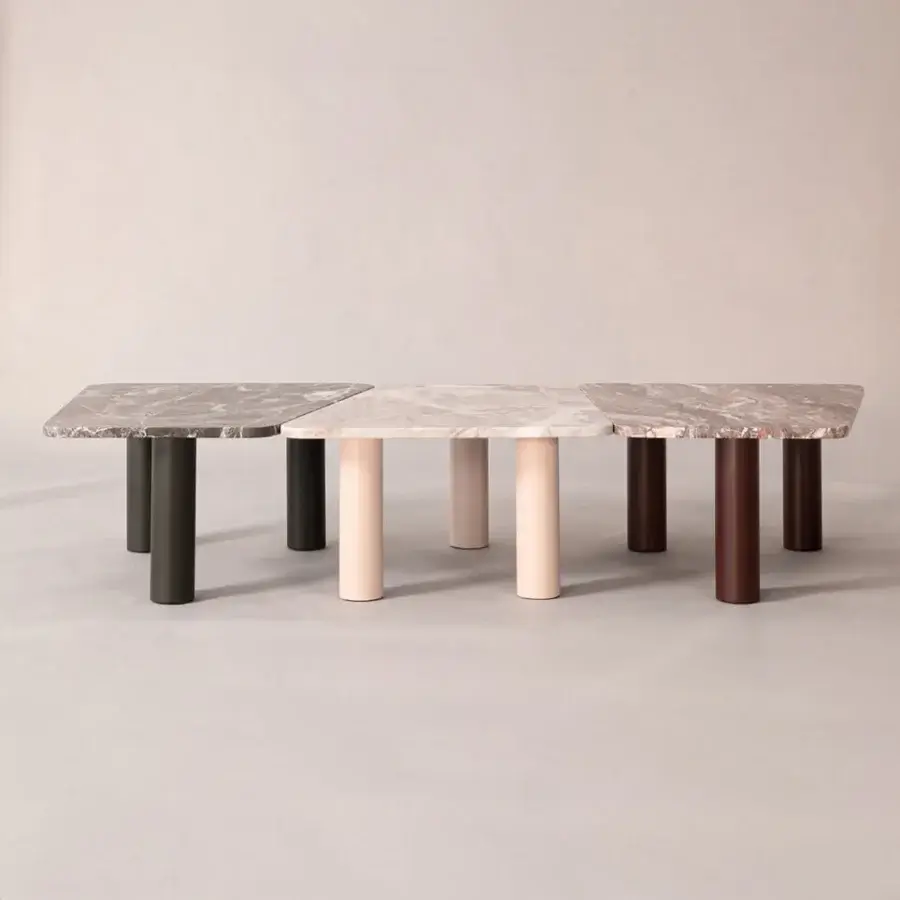Distinguished Cierre1972 Iceberg coffee table with reddish-brown marble-like tabletop and dark brown cylindrical legs crafted for balanced design