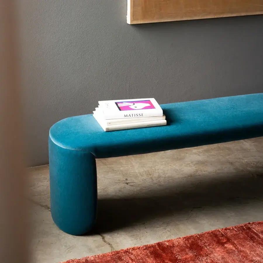 Exclusive Bross Petal bench crafted in Italy with luxurious teal velvet upholstery presents a rounded form