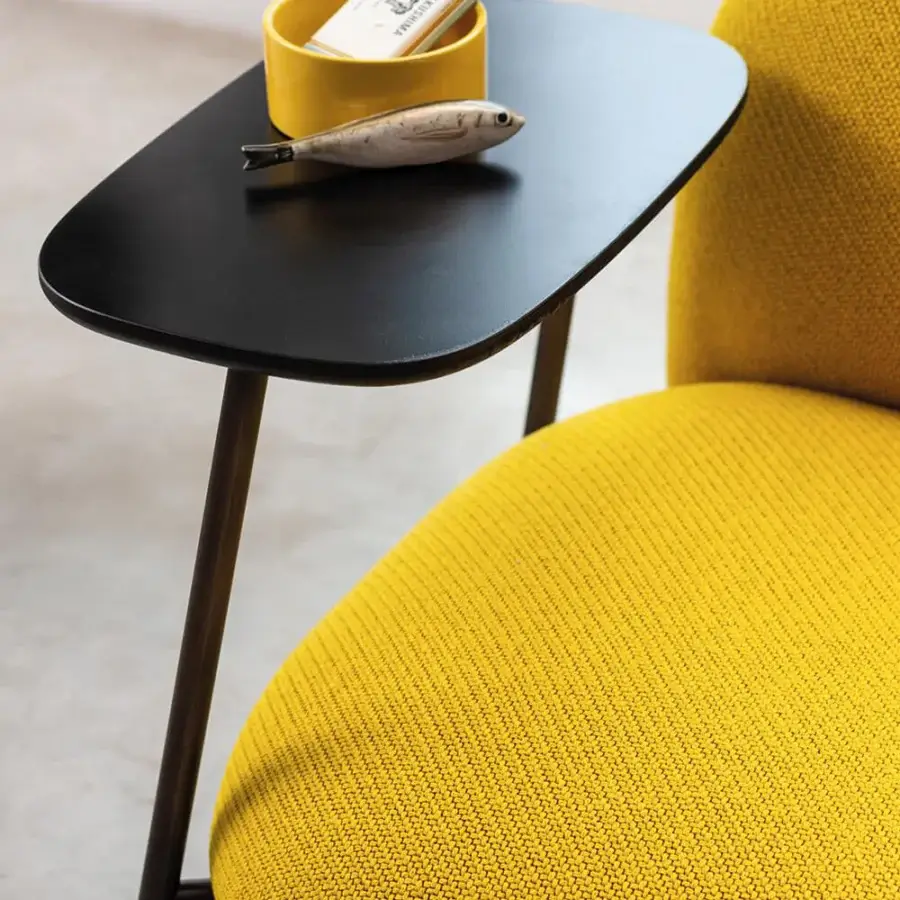Distinguished Bross Sit lounge chair crafted in Italy with yellow textured fabric upholstery and a high-end metal frame