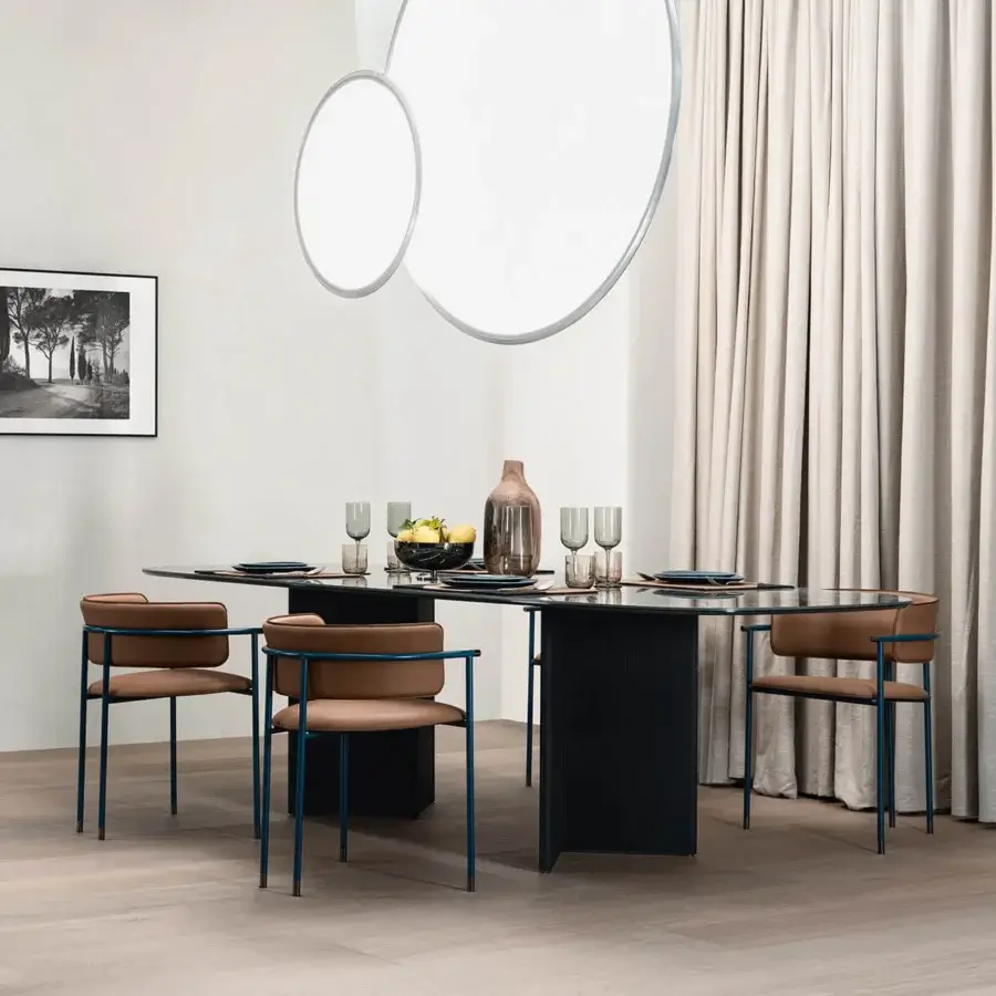 Distinguished Cierre1972 Wings table with black ceramic and tempered glass top, plus black textured leather winged legs