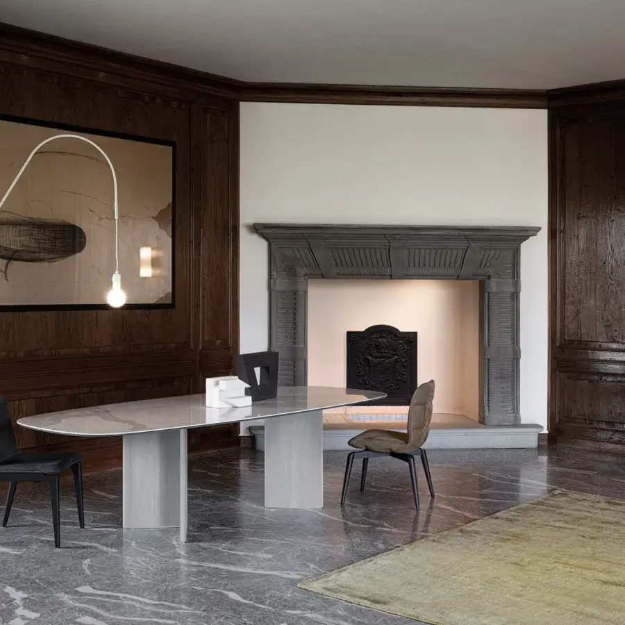 Elegant Cierre1972 Wings table with light gray ceramic and printed Leather, exhibiting a glossy finish
