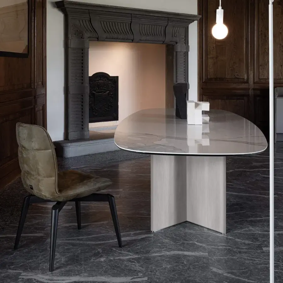 Captivating Cierre1972 Wings table with printed Leather legs and ceramic top displaying light marble finish with gray veining