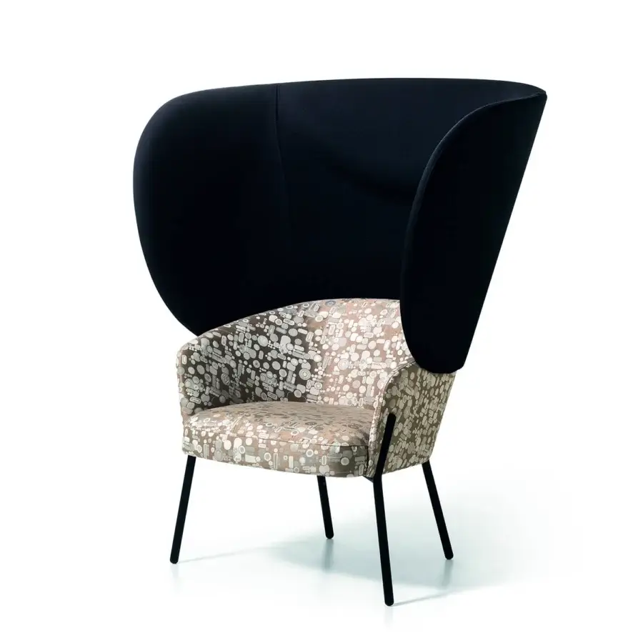 Sophisticated Bross Wam lounge chair with black fabric and patterned beige, brown, white textile upholstery with slender metal legs