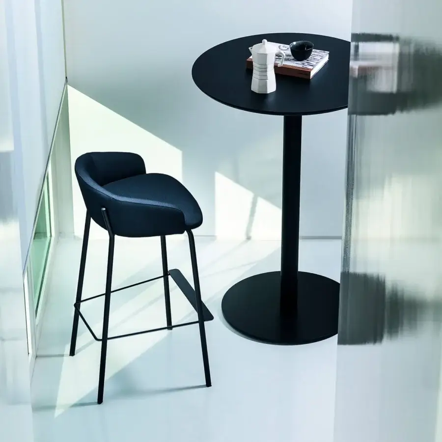 Superior Bross Wam stool crafted with a slender metal frame and dark blue premium fabric upholstery with a matte finish