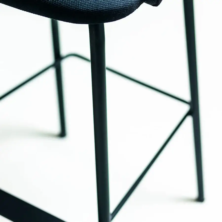 Distinguished Bross Wam stool with dark blue woven fabric and sleek matte black metal frame crafted in Italy