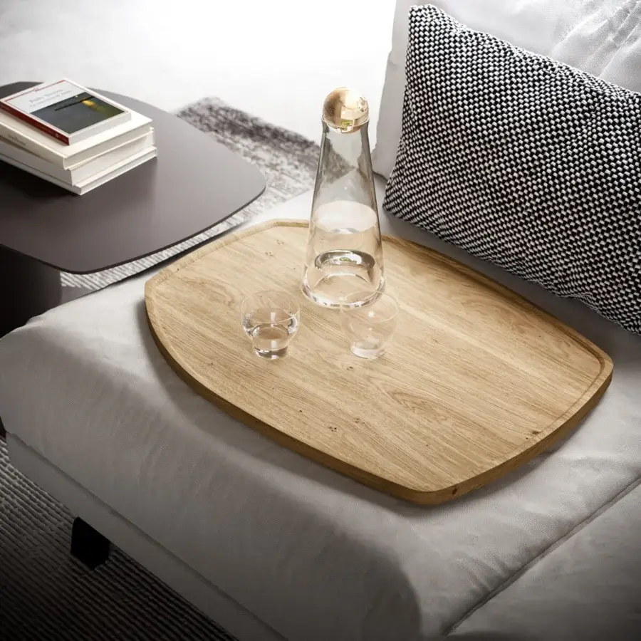 Elegant Ozzio Italia Zoom side table with shaped metal top and metal structure in graphite coating with smooth matte finish