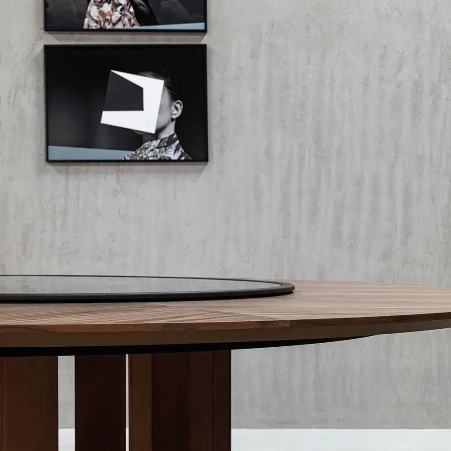 Elegant Cierre1972 Tao table with a round wooden top and ceramic Lazy Susan turntable in a marble effect finish