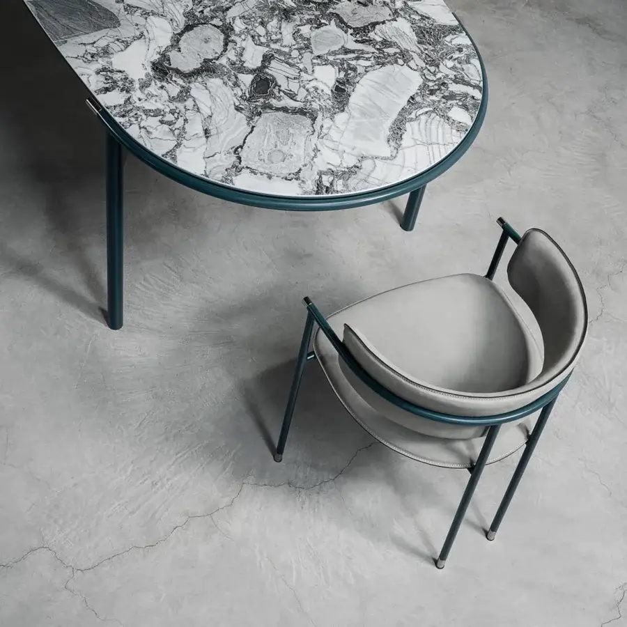 Captivating Cierre1972 Mac table with a semi-oval marble top and distinct teal metal frame crafted in Italy