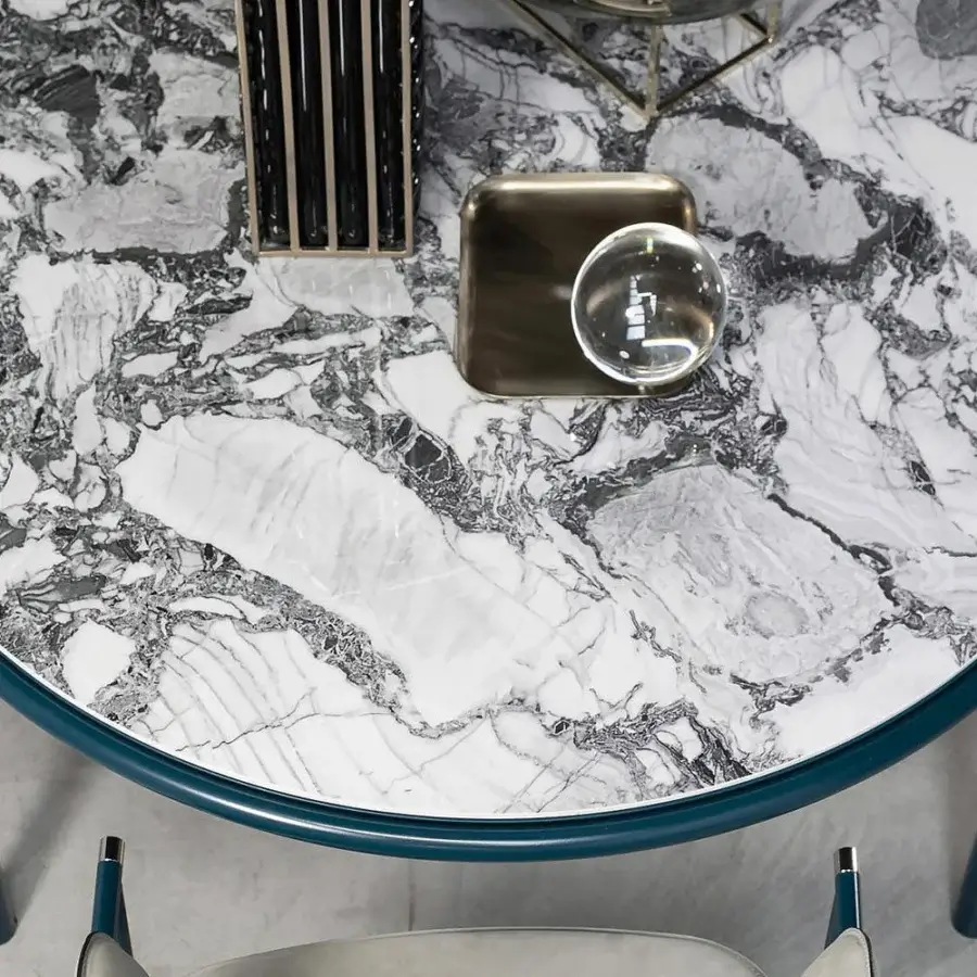 Superior Cierre1972 Mac table with marble top showcasing white and gray veining and a teal or dark blue frame