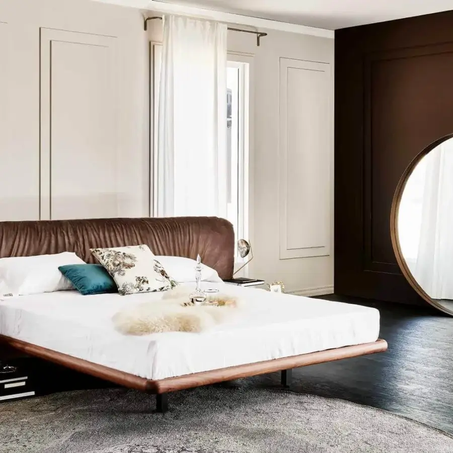 Elegant Cattelan Italia Wish Magnum mirror with brushed bronze lacquered steel frame and circular design