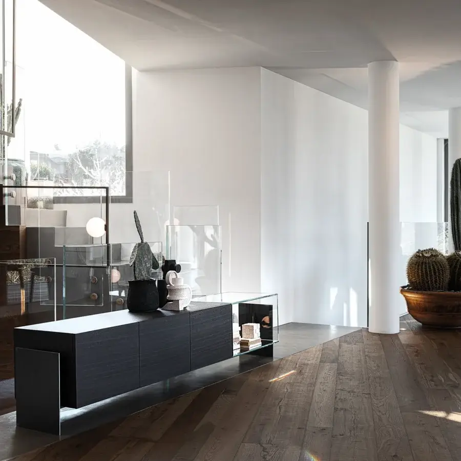 Superior Cierre1972 Fly sideboard with dark-toned wood and matte finish, showcasing handle-free cabinets and a lighter shelf with metal support