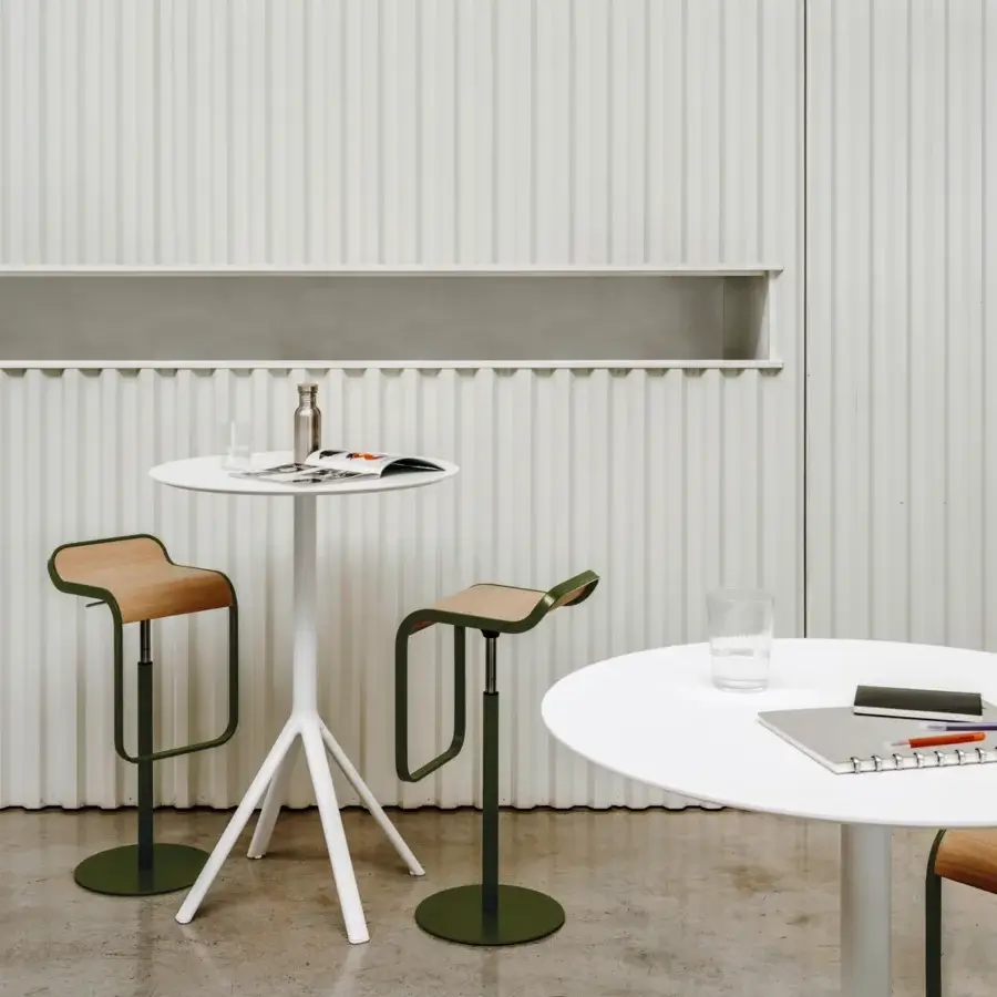 Distinguished Lapalma Fork bar table with white HPL Fenix® top and powder-coated aluminum base crafted with beveled edges