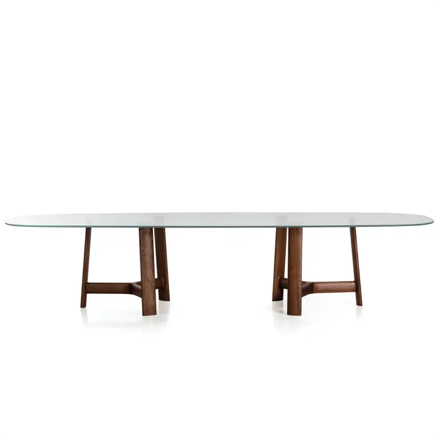 Luxury Bross River table with an extra clear glass top and dark brown matte wooden bases crafted in Italy
