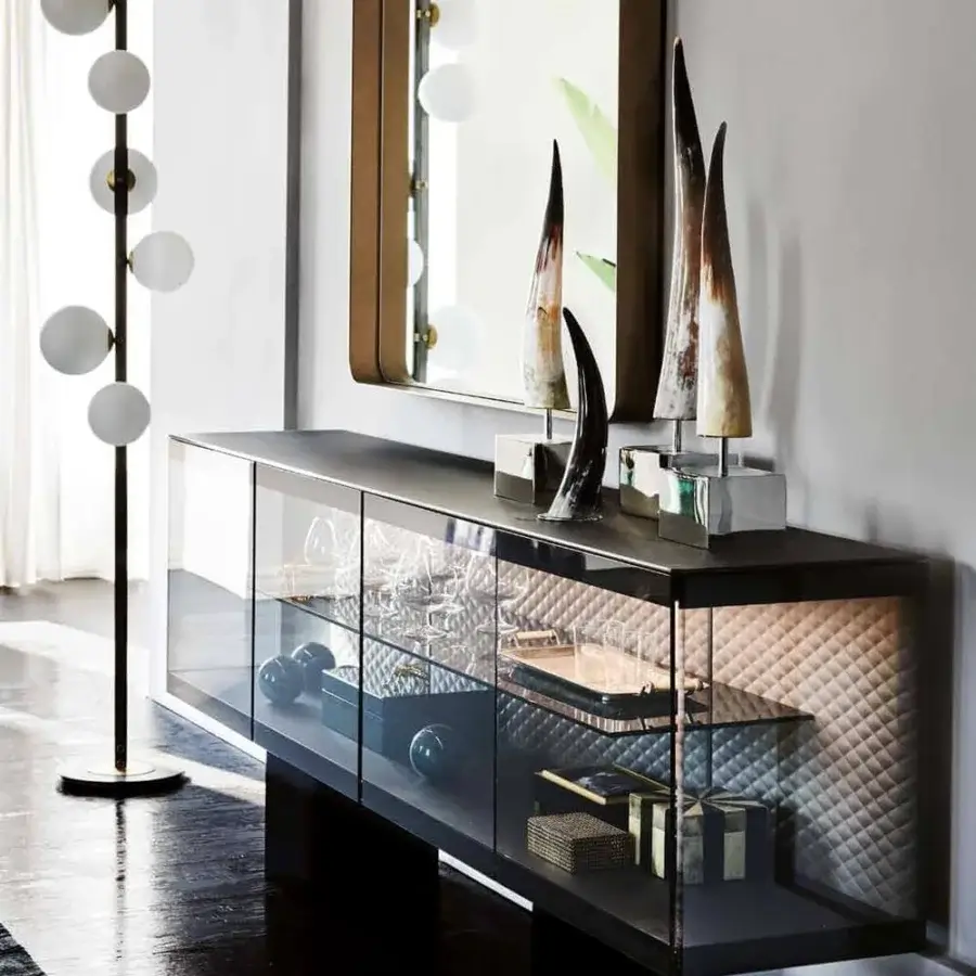 Refined Cattelan Italia Wish S mirror with a brushed bronze lacquered steel frame and rounded corners for visual depth