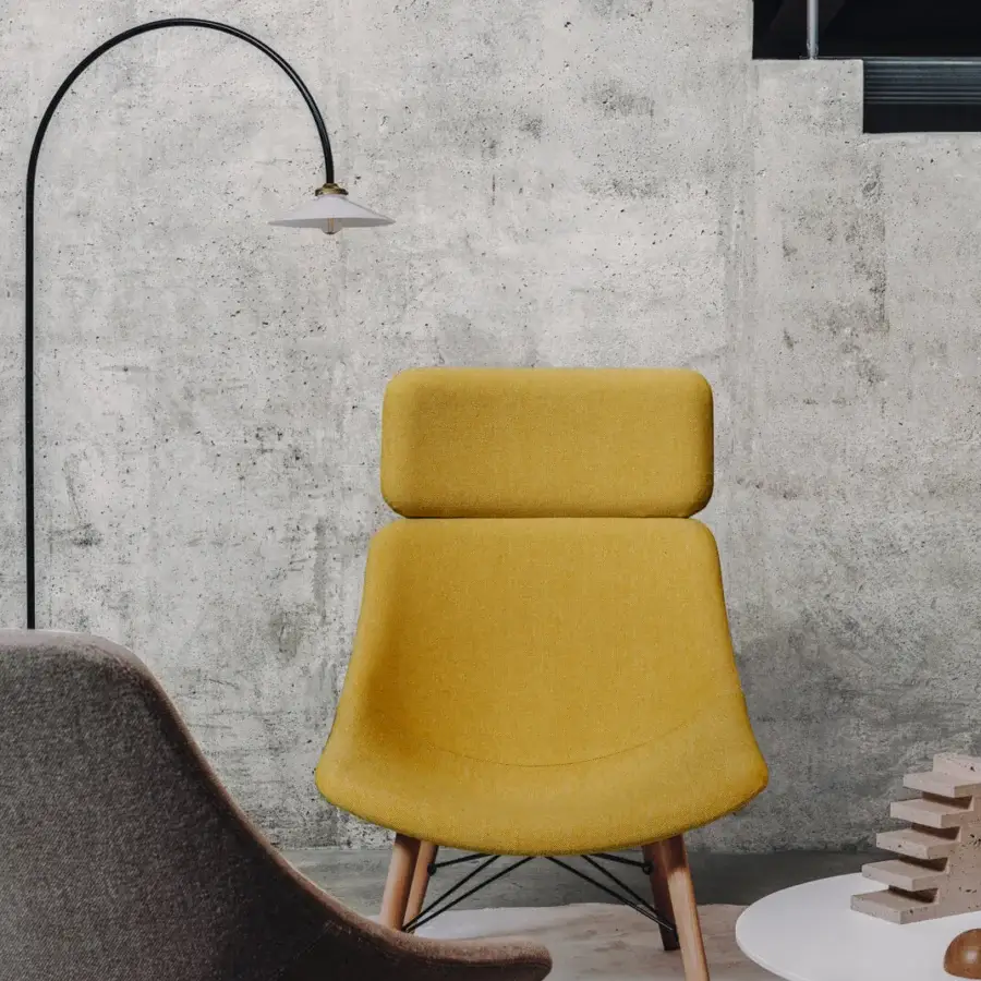 Exceptional Lapalma Auki lounge chair with headrest upholstered in vibrant yellow textile with a solid ash wood base and black metal framework