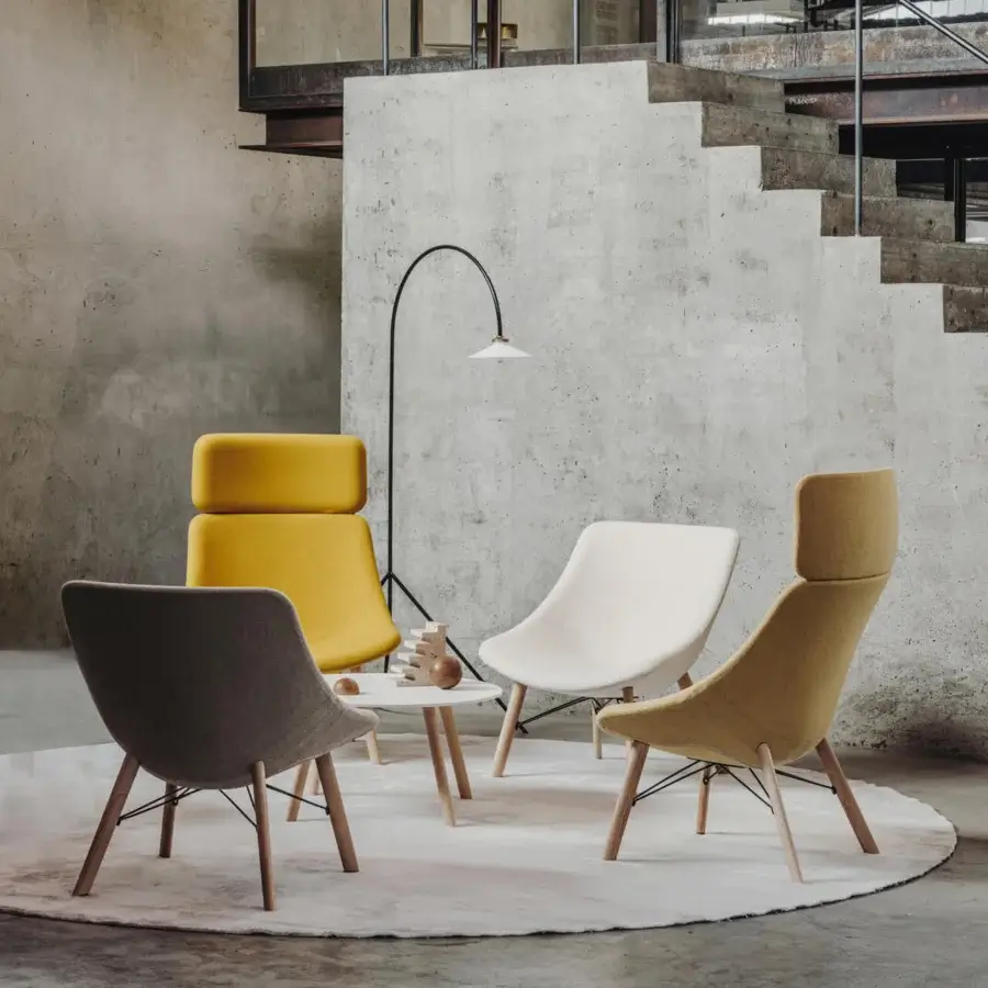 Distinguished Lapalma Auki lounge chair with headrest upholstered in muted yellow textile and built with a matte ash wood base
