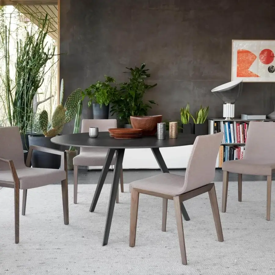Distinguished Potocco Katana indoor table with dark matte material and embossed painted metal three-legged base