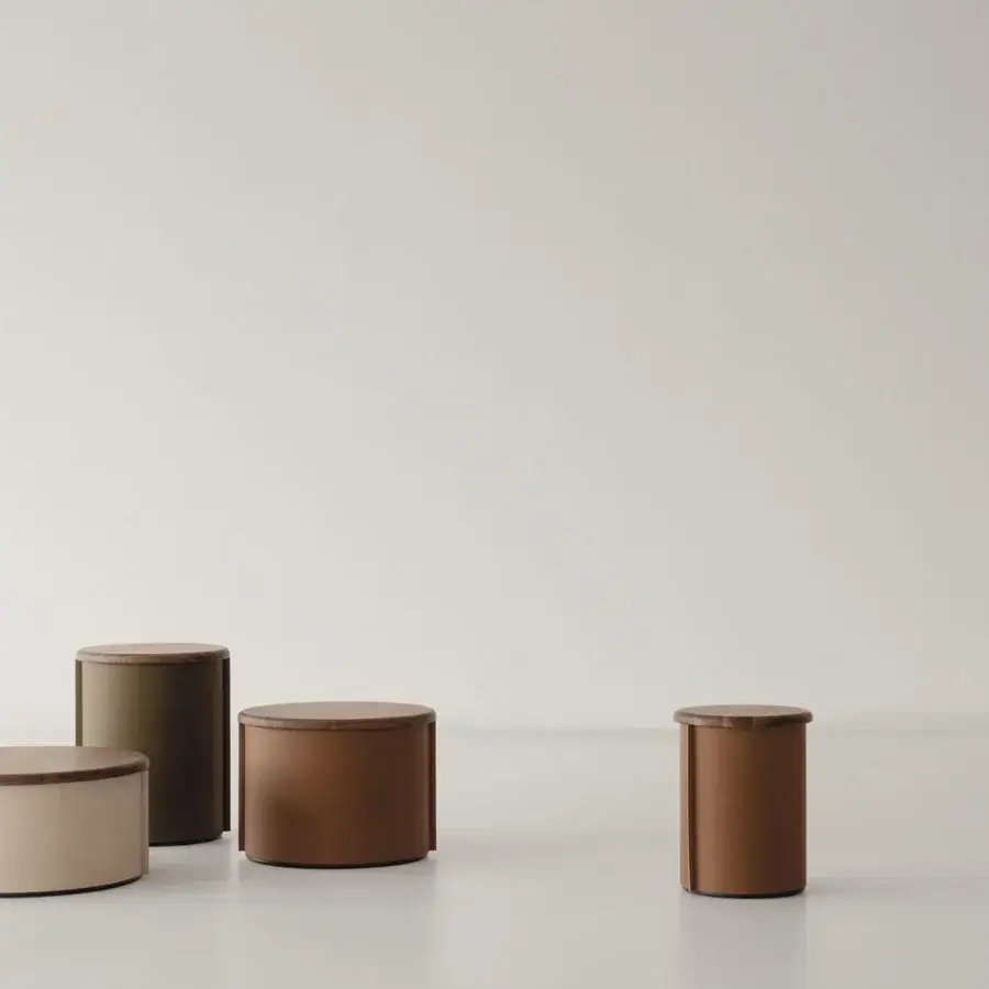 Superior Cierre1972 Tappo side table with a brown cylindrical form and natural wood grain lid crafted in leather