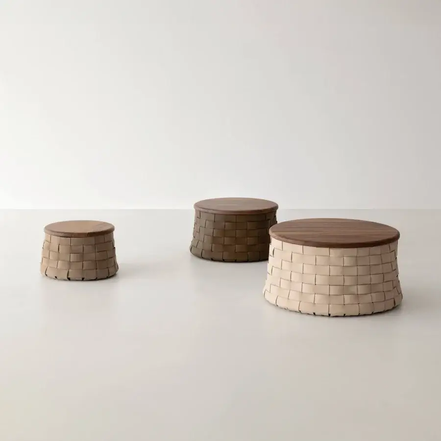 Captivating Cierre1972 Dama coffee table with woven-leather structure and round wood top in warm brown tones and matte finish