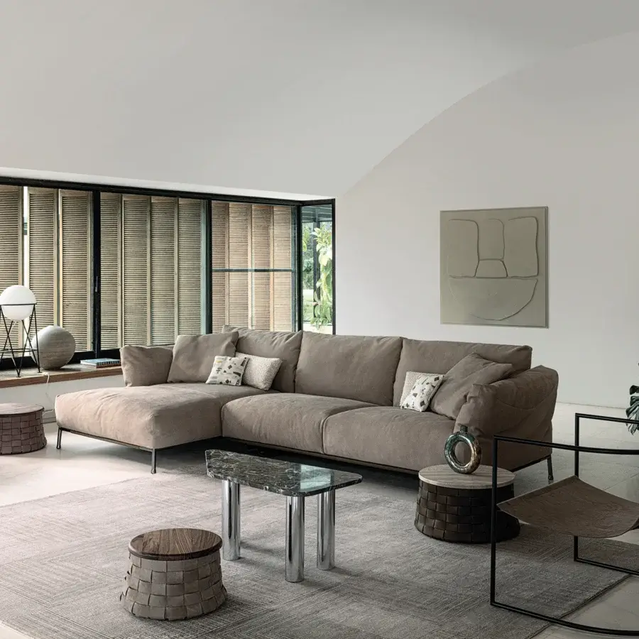 Superior Cierre1972 Dama coffee table with dark grey tabletop and light veining built upon silver metal legs in woven leather
