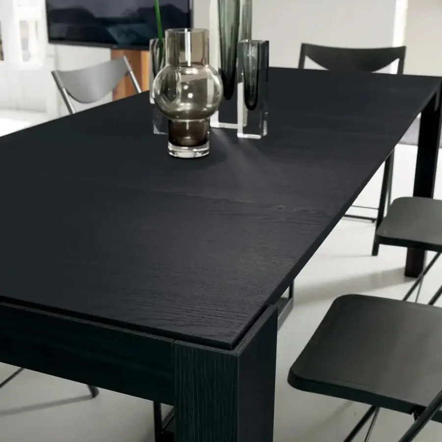 Exceptional Ozzio Italia A4 console to table crafted in dark wood with a matte finish and castors