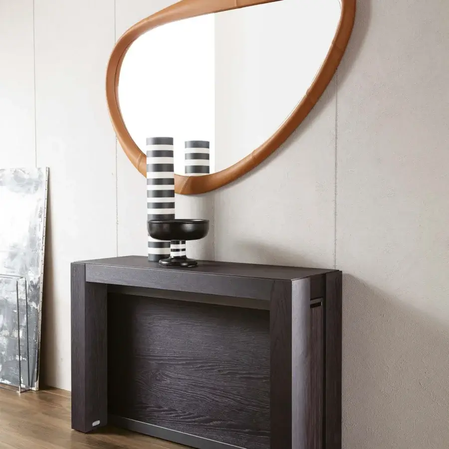 Exceptional Ozzio Italia A3 console to table crafted in wood with a dark matte finish and visible grain