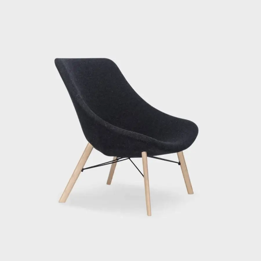 Exceptional Lapalma Auki lounge chair with curved form upholstered in dark gray coarse textile and built with light tone solid ash wood legs