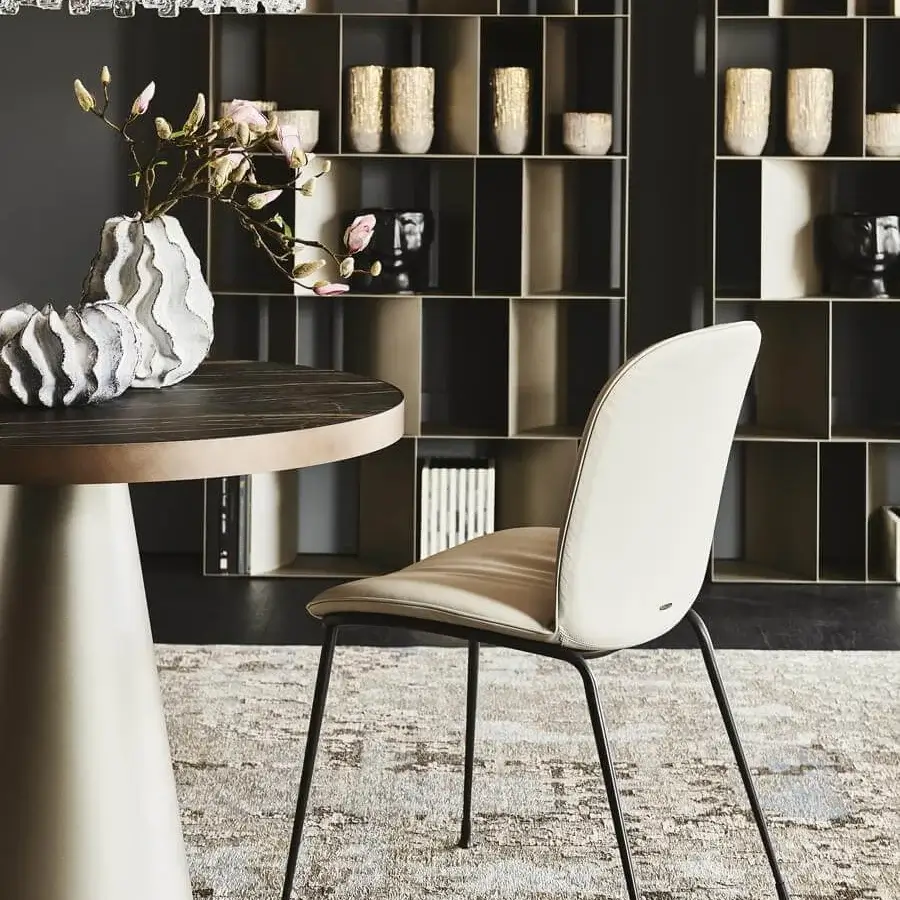 Sophisticated Cattelan Italia Tina chair with light beige textile upholstery and black embossed lacquered steel frame