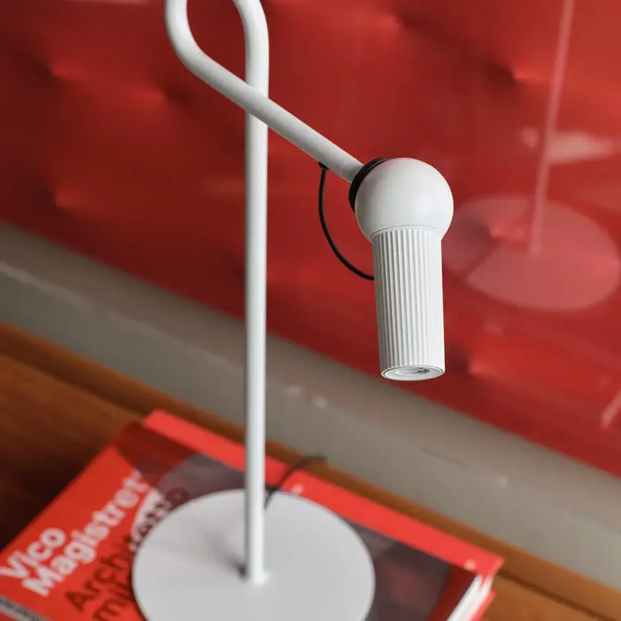 Exceptional Kundalini Bird table lamp with die-cast varnished aluminum head and premium coated metal structure