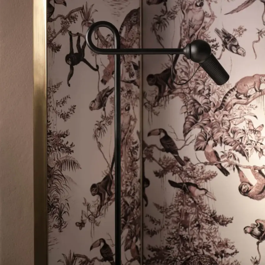 Distinguished Kundalini Bird floor lamp with slim-line metal structure and die-cast varnished aluminum head crafted in Italy