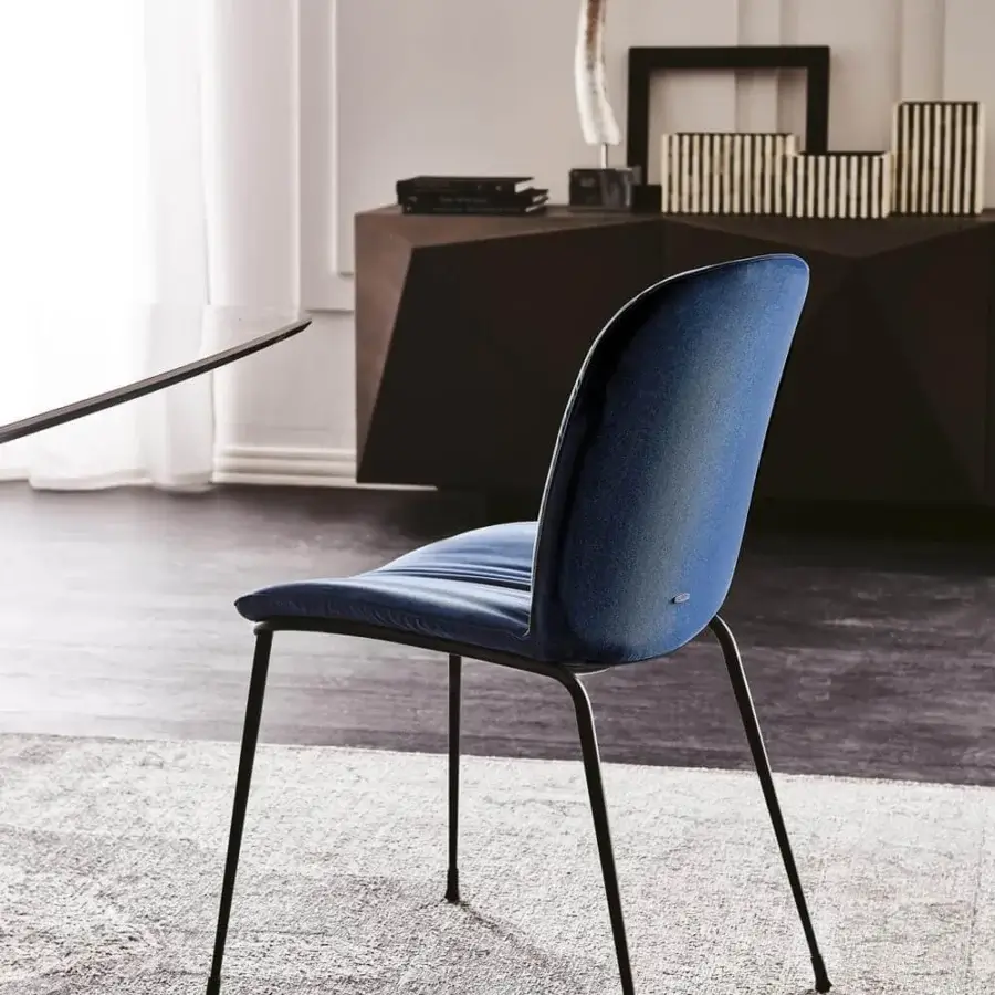Distinguished Cattelan Italia Tina chair in plush blue velvet with black embossed lacquered steel frame